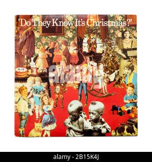 Sleeve for old original Phonogram Ltd vinyl 45 RPM record Do They Know It's Christmas by Band Aid 1984 isolated on white. Geldof and Ure Stock Photo