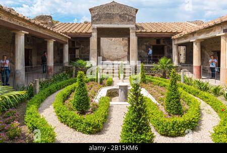 POMPEII, ITALY - MAY 13: A beautiful ancient house. Pompeii is an ancient Roman city died from the eruption of Mount Vesuvius in 79 AD. Stock Photo
