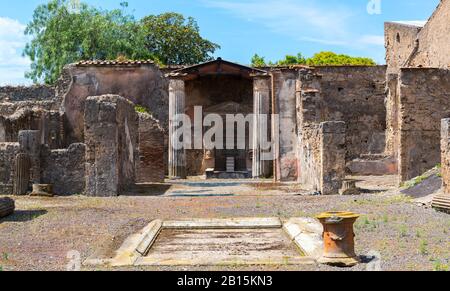 Ruins of a house in Pompeii, Italy. Pompeii is an ancient Roman city died from the eruption of Mount Vesuvius in 79 AD. Stock Photo