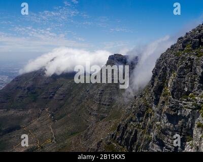 The plateau of Table Mountain in Cape Town is covered in clouds Stock Photo