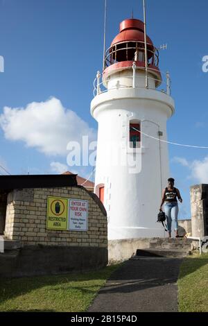 The lighthouse at Vigie, a symbol of hope for ships entering the port and a viewpoint popular with photographers and tourists alike Stock Photo