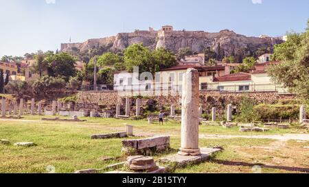 Scenic panoramic view of Roman Agora overlooking Acropolis, Athens, Greece. It is one of the main landmarks of Athens. Panorama of Athens center near Stock Photo