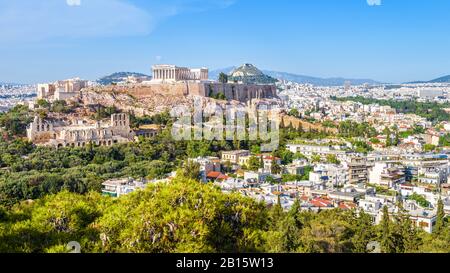 Aerial view of Athens with Acropolis hill, Greece. Famous ancient Acropolis is a top landmark of Athens. Scenic panorama of Athens city taken from abo Stock Photo