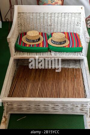 Camacha, Madeira, Portugal - April 19, 2018: Traditional Wicker Basket Sledges in a factory shop in Camacha on Madeira Island. Portugal Stock Photo