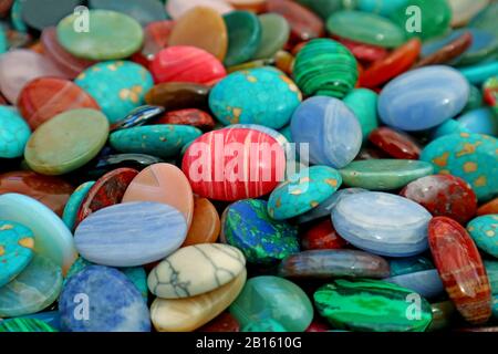Pile of multi color semi precious stones for background or wallpaper Stock Photo