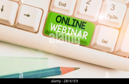 Conceptual hand writing showing Online Webinar. Concept meaning online meeting or presentation held via the Internet Stock Photo