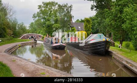 Narrowboat exiting Tatenhill Lock on the Trent and Mersey Canal, Derbyshire, Burton-on-Trent,  England, UK, Britain, Stock Photo