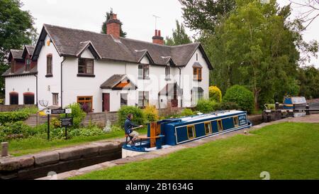 Narrowboat in Tatenhill Lock on the Trent and Mersey Canal, Derbyshire, Burton-on-Trent,  England, UK, Britain Stock Photo