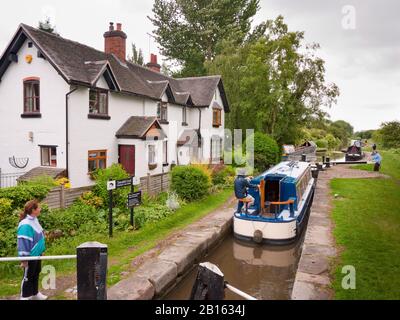 Narrowboat in Tatenhill Lock on the Trent and Mersey Canal, Derbyshire, Burton-on-Trent,  England, UK, Britain Stock Photo