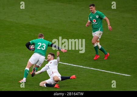 London, UK. 23rd Feb 2020. Elliott Daly of England tap tackles Keith Earls of Ireland during Guinness Six Nations between England and Ireland at Twickenham Stadium, London, England on 23 February (Photo by Mitchell Gunn/Espa-Images) Credit: European Sports Photographic Agency/Alamy Live News Stock Photo
