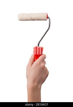 Hand holding paint roller for walls with red pen isolated on white background Stock Photo