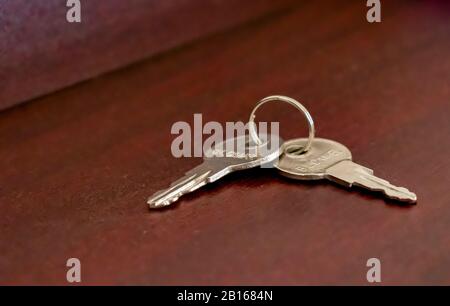 A lock is a mechanical or electronic fastening device that is released by a physical object , or by a combination thereof or only being able to be ope Stock Photo