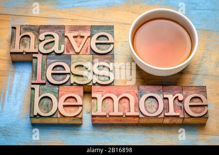 have less , be more - minimalism concept - word abstract in vintage letterpress wood type printing blocks , simplicity, mindset and lifestyle concept Stock Photo