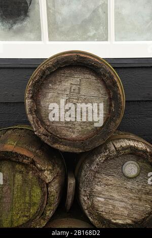 Zaanse Schans, Zaandam, Zaandijk,The Netherlands, 20 January 2020. Old used wooden Amstel beer barrels lying outdoor Stock Photo