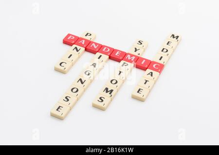 Letter tiles for medical response to 2020 cases in Coronavirus Pandemic COVID-19 which WHO may classify as a pandemic. Symptoms, medication, etc. Stock Photo