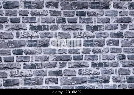 Pattern of decorative slate stone wall surface Stock Photo