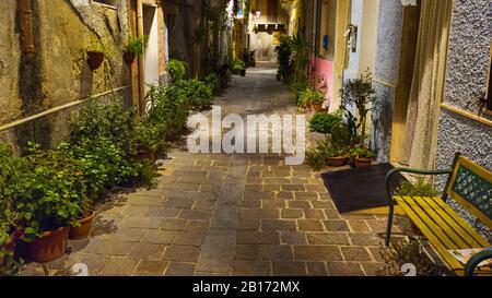 Carloforte, Italy - September 22, 2019: Night shoot of suggestive route between ancient palaces of the Italian village of Carloforte in Sardinia Stock Photo