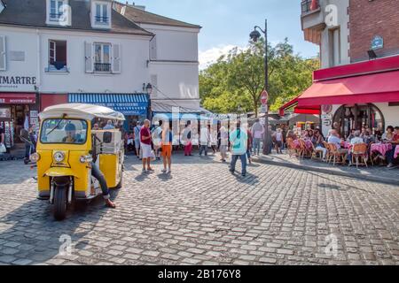 Paris, France - September 17, 2019: People visiting the colorful neighborhood of Montmartre in Paris Stock Photo