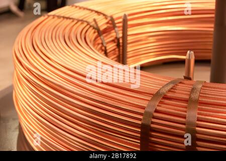 Bended fat curved copper cables. Stock Photo