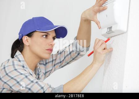 a female technician at work Stock Photo