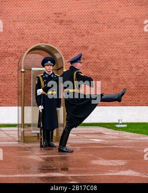 Kremlin regiment guard inspection with marching soldier goose step, Tomb of the Unknown Soldier war memorial, Alexander Gardens, Moscow, Russia Stock Photo