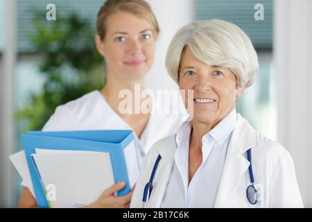 portrait of a smiling senior doctor Stock Photo