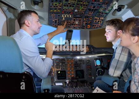 pilots and apprentices inside cabin Stock Photo
