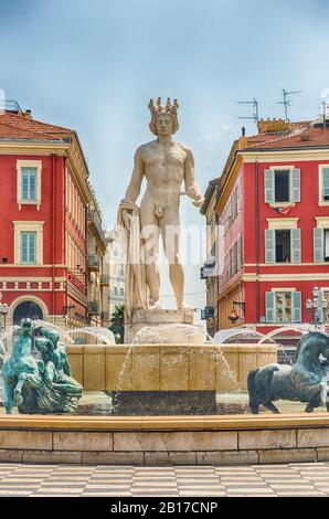 The scenic Fontaine du Soleil with the statue of Apollo in Place Massena, major landmark in Nice, Cote d'Azur, France Stock Photo