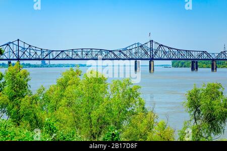 The old and new versions of the Vicksburg Bridge, also known as the Mississippi River Bridge, span the Mississippi River in Vicksburg, Mississippi. Stock Photo