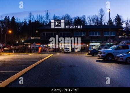 ABBOTSFORD, CANADA - FEBRUARY 10, 2020: retail store strip mall in early morning. Stock Photo