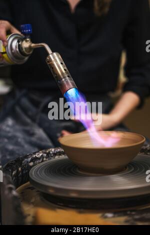 Close-up of potter working on workpiece Stock Photo