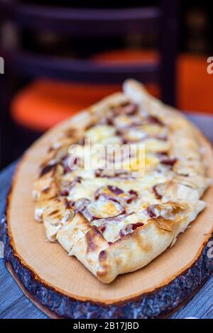 Pide turkish delight with sucuk and cheese Stock Photo