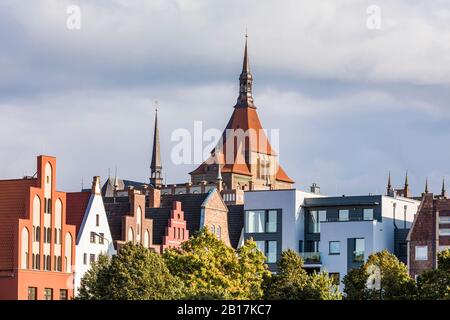 Germany, Mecklenburg-West Pomerania, Rostock, Old town buildings and tower of St. Marys Church Stock Photo