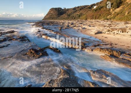 Dramatic seascape in morning light at Dudley Beach - Newcastle NSW Australia. This beach is located a few kilometers south of the main city centre of Stock Photo
