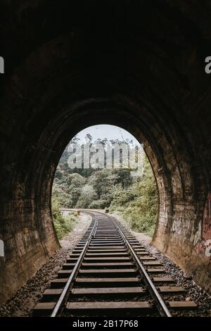 Sri Lanka, Uva Province, Demodara, Tunnel leading to Nine Arch Bridge Stock Photo