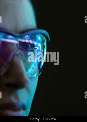 Reflection of a circuit board on glasses Stock Photo