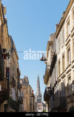 France, Gironde, Bordeaux, Old town residential buildings with Bordeaux Cathedral in background Stock Photo