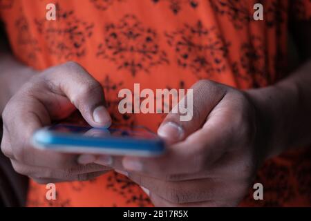 Close up of man hand use smart phone at night  Stock Photo