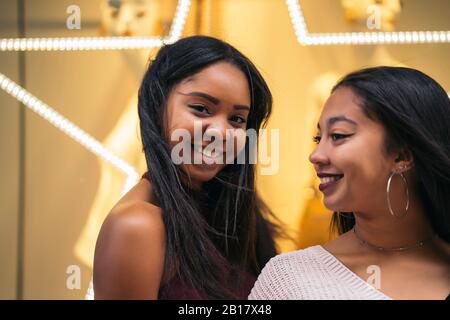 Portrait of two happy attractive young women Stock Photo