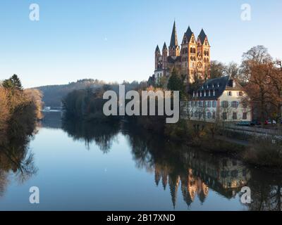 Germany, Hesse, Limburg an der Lahn, Limburg Cathedral reflecting in Lahn river Stock Photo