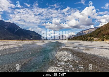 New Zealand, Grey District, Inchbonnie, Clouds over Waimakariri River in Arthurs Pass National Park Stock Photo