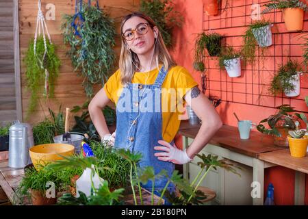 Portrait of confident young woman on her terrace Stock Photo