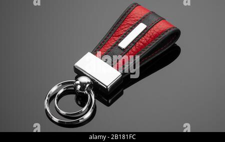 leather key chain with ring on black background Stock Photo