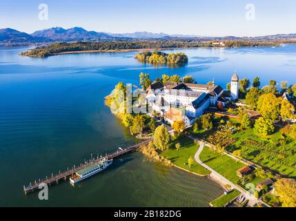 Germany, Bavaria, Aerial view of pier and monastery on Frauenchiemsee islet Stock Photo