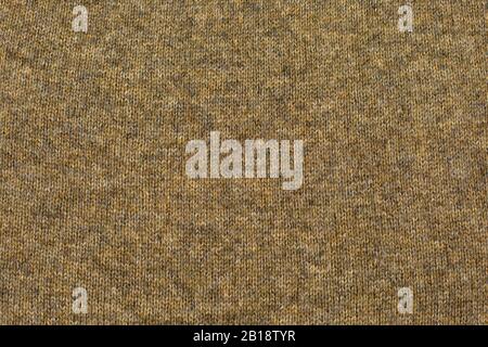 Brown fabric texture pattern knitted fabric made of wool Stock Photo