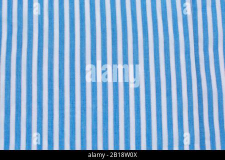 White and blue striped Fabric Swatch with silver thread Stock Photo