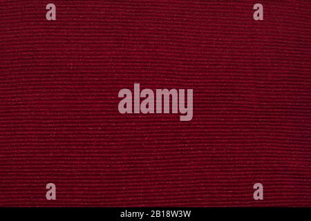 Texture of dark burgundy knitwear with silver thread, Stock Photo