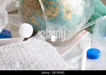 The concept of world environment day with globe in plastic bag Stock Photo