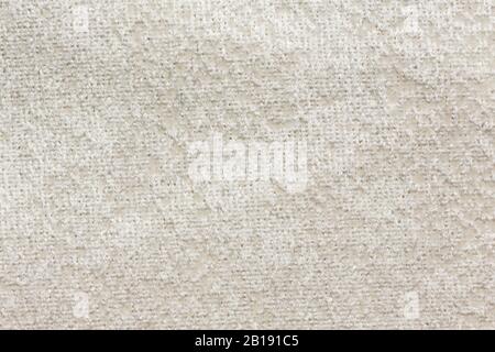 Relief textile background with clean white surface. High resolution photo. Stock Photo