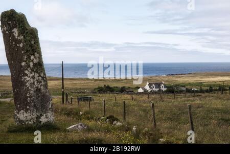 Trussel Stone (Clach an Trushal in Gaelic) is sited in the village of Ballantrushal on the west side of the island of Lewis, Outer Hebrides, Scotland Stock Photo